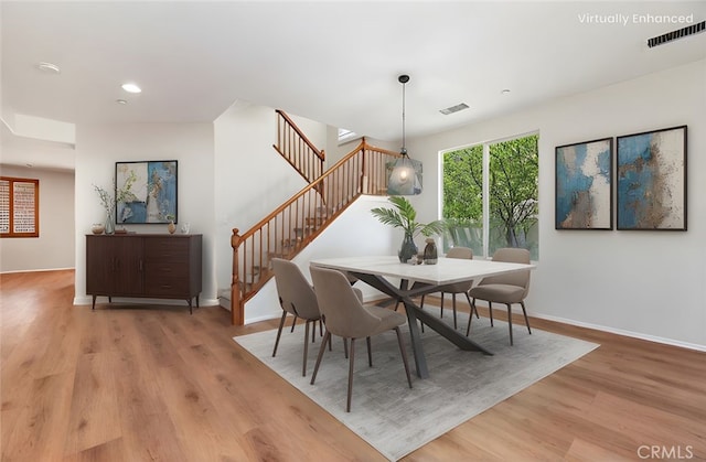 8167 Faircrest Rd, Riverside, CA 92508 - dining space featuring stairs, light wood finished floors, baseboards, and recessed lighting