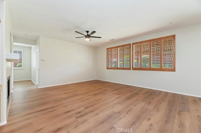 8167 Faircrest Rd, Riverside, CA 92508 - unfurnished room with ceiling fan, plenty of natural light, light wood-type flooring, and baseboards