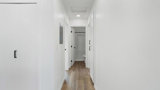 5259 Imperial Ave, San Diego, CA 92114 - hall with light wood-type flooring, baseboards, attic access, and recessed lighting