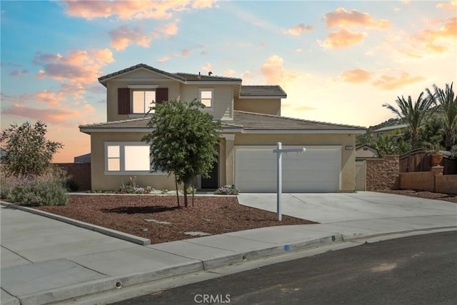 30527 Expedition Dr, Winchester, CA 92596 - traditional home with stucco siding, driveway, a garage, and a tiled roof