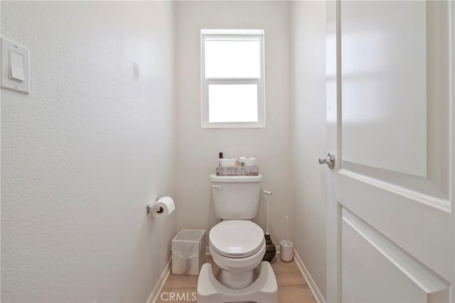 30527 Expedition Dr, Winchester, CA 92596 - bathroom featuring baseboards and wood finished floors
