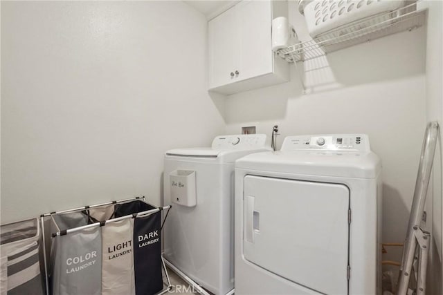 30527 Expedition Dr, Winchester, CA 92596 - laundry area with cabinet space and washer and clothes dryer