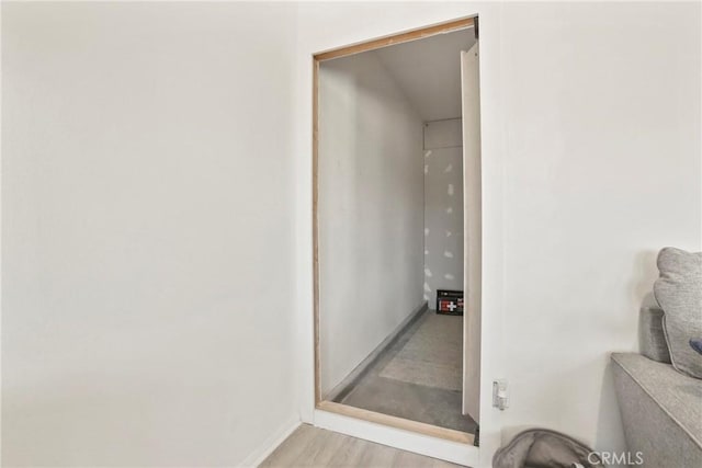 30527 Expedition Dr, Winchester, CA 92596 - corridor featuring baseboards and light wood-style flooring