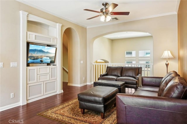 4437 Owens St Unit 104, Corona, CA 92883 - living room with arched walkways, a ceiling fan, dark wood-type flooring, baseboards, and ornamental molding