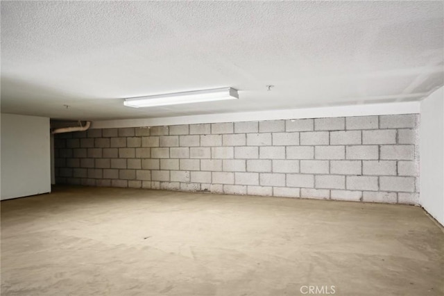 4437 Owens St Unit 104, Corona, CA 92883 - finished below grade area with concrete block wall and a textured ceiling
