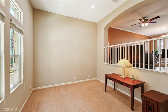 4437 Owens St Unit 104, Corona, CA 92883 - carpeted spare room with healthy amount of natural light, baseboards, a ceiling fan, and arched walkways