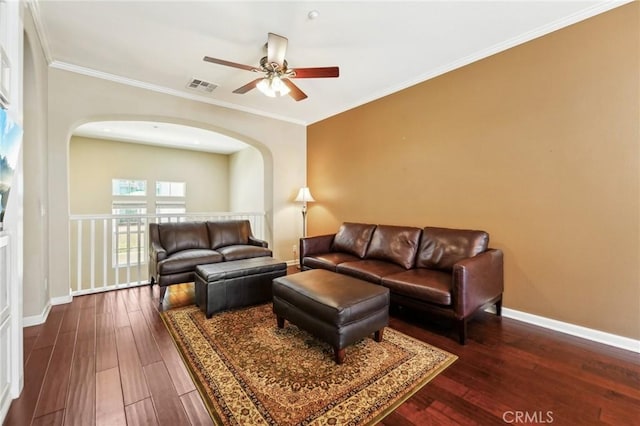 4437 Owens St Unit 104, Corona, CA 92883 - living area with ceiling fan, dark wood-style flooring, arched walkways, crown molding, and baseboards