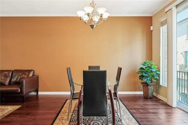 4437 Owens St Unit 104, Corona, CA 92883 - dining space featuring wood finished floors, a chandelier, crown molding, and baseboards