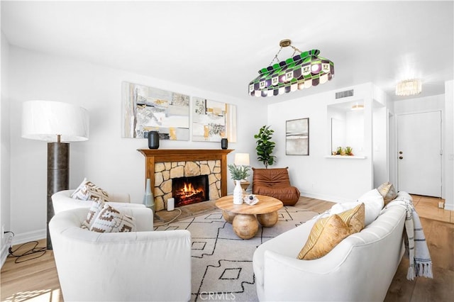 20 Grant, Irvine, CA 92620 - living room featuring wood finished floors, a fireplace, and baseboards