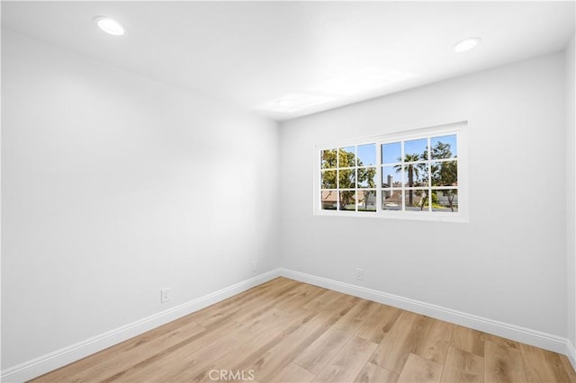 20 Grant, Irvine, CA 92620 - empty room featuring baseboards, light wood-type flooring, and recessed lighting