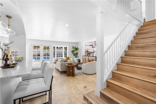 20 Grant, Irvine, CA 92620 - stairway with tile patterned flooring, french doors, arched walkways, and recessed lighting