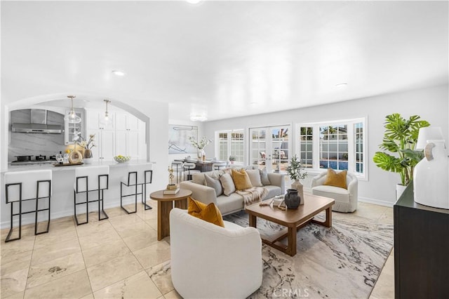 20 Grant, Irvine, CA 92620 - living area featuring recessed lighting, baseboards, and arched walkways
