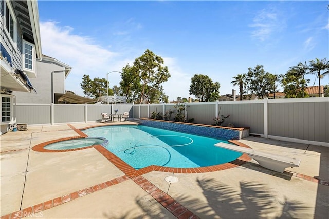20 Grant, Irvine, CA 92620 - view of swimming pool featuring a patio, a fenced backyard, a pool with connected hot tub, and a diving board