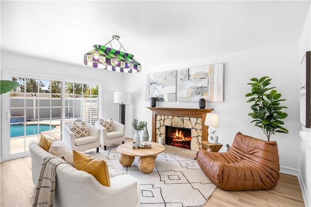 20 Grant, Irvine, CA 92620 - living area with wood finished floors, a fireplace, and baseboards