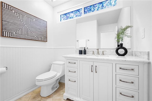 20 Grant, Irvine, CA 92620 - bathroom with toilet, a wainscoted wall, vanity, and tile patterned flooring