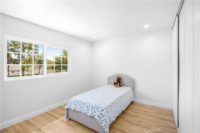 20 Grant, Irvine, CA 92620 - bedroom with baseboards, light wood-style floors, and recessed lighting