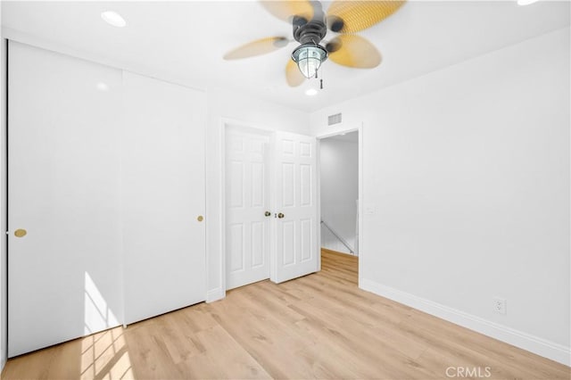 20 Grant, Irvine, CA 92620 - unfurnished bedroom with a closet, light wood-style floors, baseboards, recessed lighting, and ceiling fan