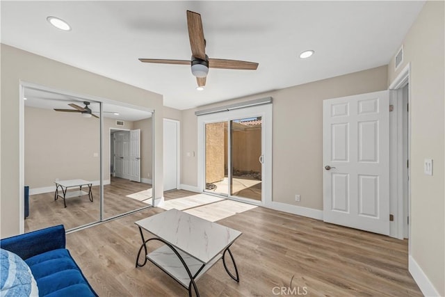 bedroom with access to outside, wood finished floors, baseboards, a ceiling fan, and recessed lighting