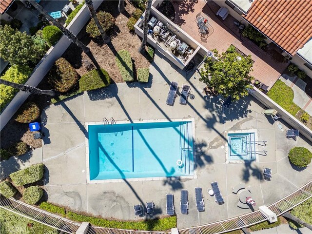drone / aerial view of a pool area
