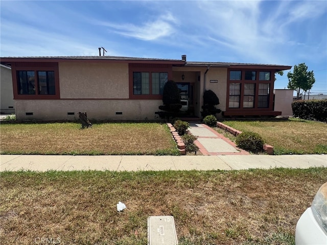 ranch-style home featuring crawl space and a front yard