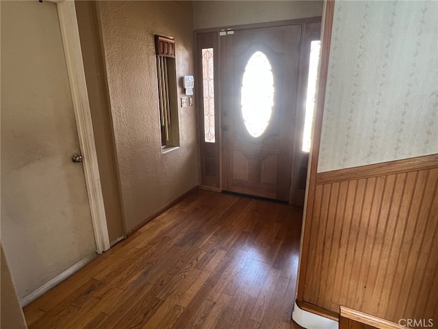 2524 W 115th St, Hawthorne, CA 90250 - foyer with wood finished floors and a textured wall