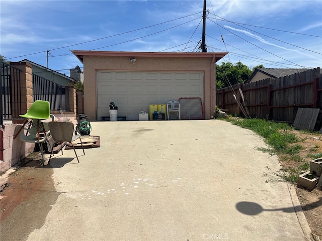 garage with fence