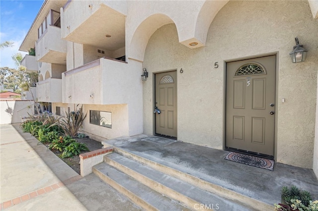 676 Shepard St Unit 6, San Pedro, CA 90731 - doorway to property featuring stucco siding