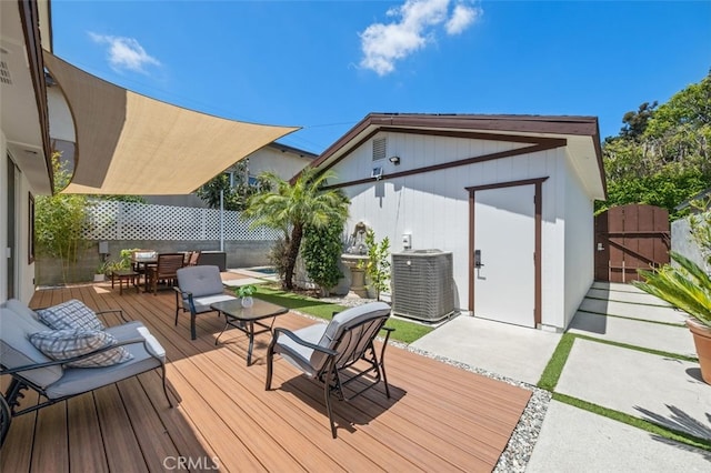 5653 Franklin Ave, Los Angeles, CA 90028 - wooden deck featuring central AC unit, a fenced backyard, outdoor dining area, and a gate