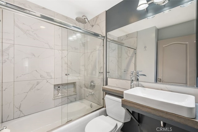 5653 Franklin Ave, Los Angeles, CA 90028 - full bathroom with enclosed tub / shower combo, vanity, and toilet