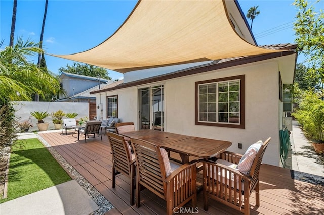 5653 Franklin Ave, Los Angeles, CA 90028 - wooden deck featuring outdoor dining space