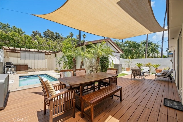 5653 Franklin Ave, Los Angeles, CA 90028 - wooden deck with outdoor dining area, a fenced backyard, area for grilling, a jacuzzi, and central AC
