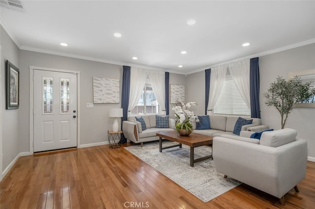 5653 Franklin Ave, Los Angeles, CA 90028 - living area featuring ornamental molding, light wood finished floors, baseboards, and recessed lighting