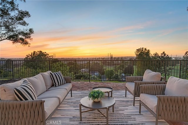 patio terrace at dusk with outdoor lounge area