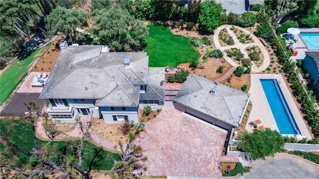 view of subject property featuring a pool area