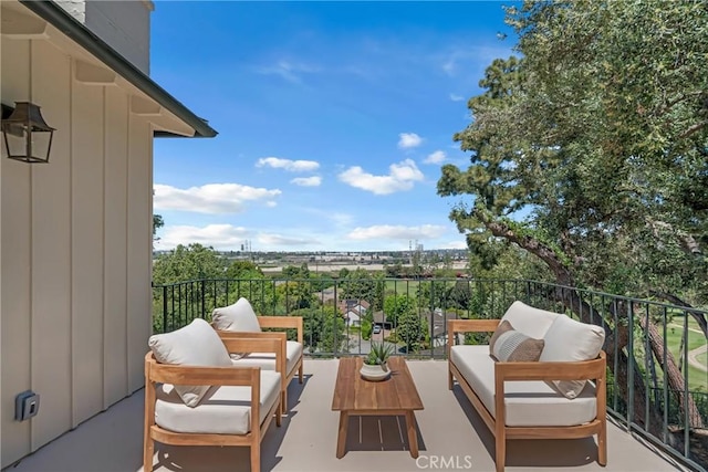 balcony with an outdoor hangout area