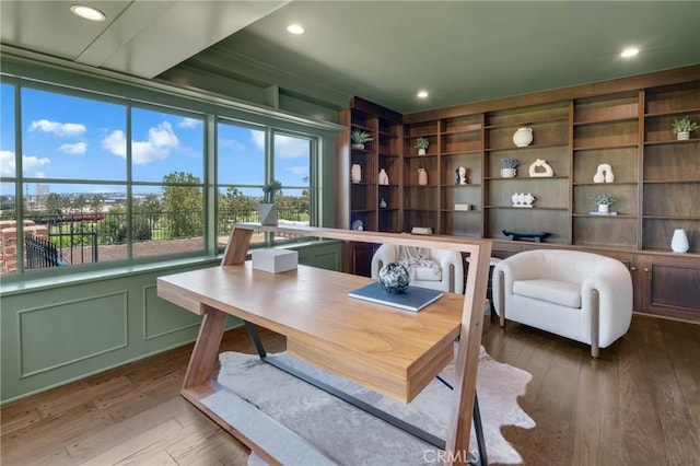 home office with hardwood / wood-style floors and recessed lighting