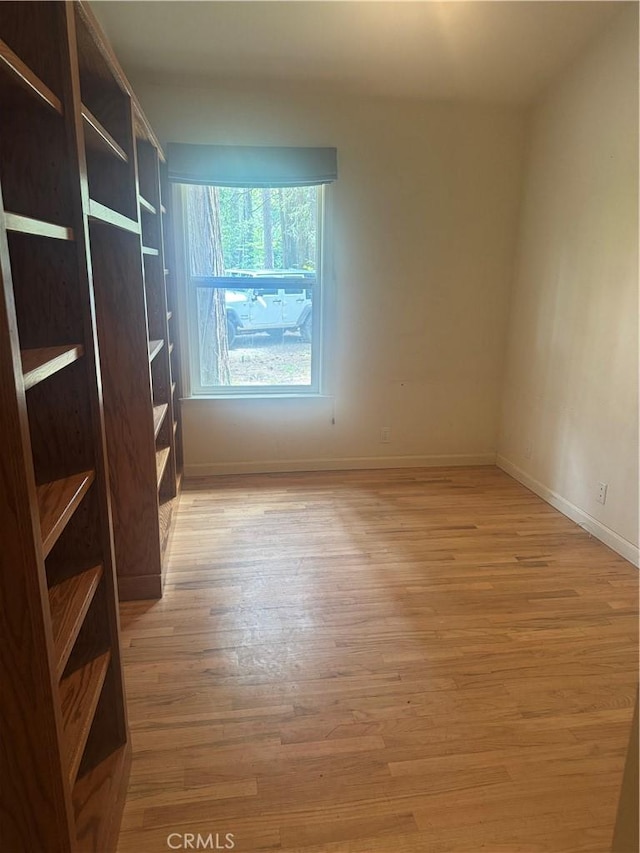 5625 Headwaters Rd, Forest Ranch, CA 95942 - unfurnished bedroom featuring wood finished floors and baseboards