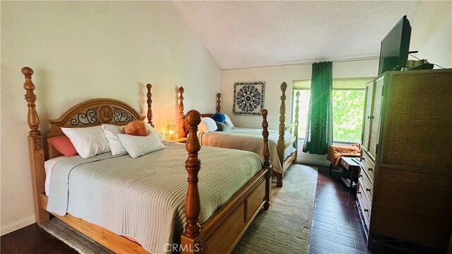 3160 Gotera Dr, Hacienda Heights, CA 91745 - bedroom with dark wood-style flooring, lofted ceiling, and baseboards