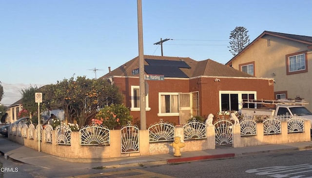 100 S Harding Ave, Oxnard, CA 93030 - view of front of property with a fenced front yard and stucco siding