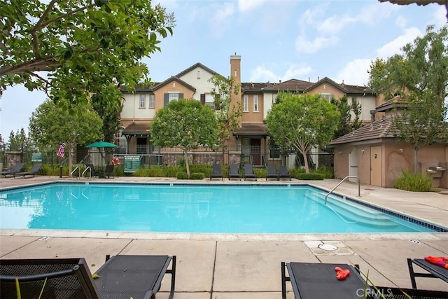 31 Tulare, Aliso Viejo, CA 92656 - community pool with fence and a patio area