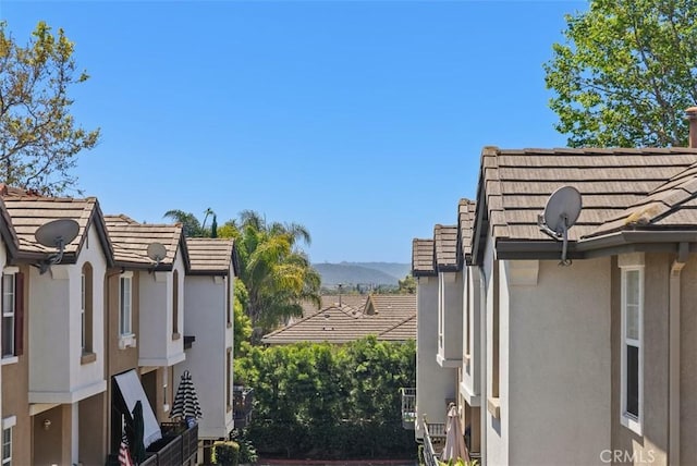 31 Tulare, Aliso Viejo, CA 92656 - exterior view of stucco siding, a downspout, a satellite dish, and gutters