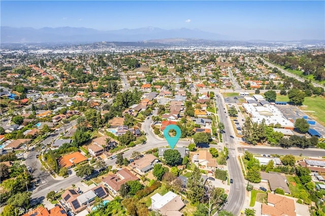 16060 Villa Flores Dr, Hacienda Heights, CA 91745 - aerial overview of property's location featuring a mountainous background and nearby suburban area