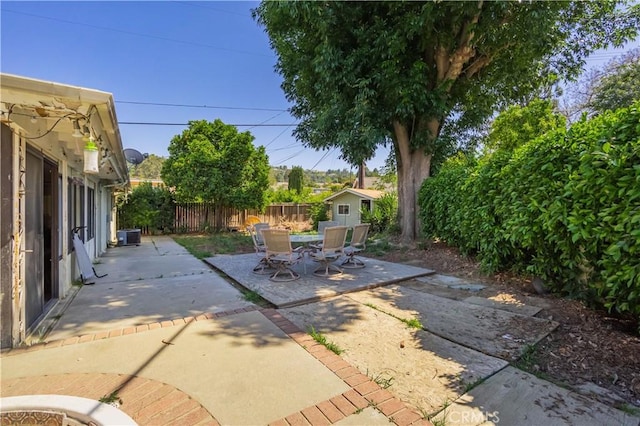 16060 Villa Flores Dr, Hacienda Heights, CA 91745 - fenced backyard with a patio, an outbuilding, and outdoor dining area