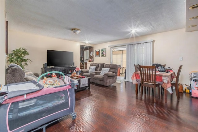 16060 Villa Flores Dr, Hacienda Heights, CA 91745 - living room featuring a textured ceiling and hardwood / wood-style floors