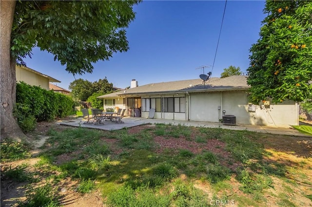 16060 Villa Flores Dr, Hacienda Heights, CA 91745 - rear view of house with a patio area, cooling unit, a chimney, and stucco siding