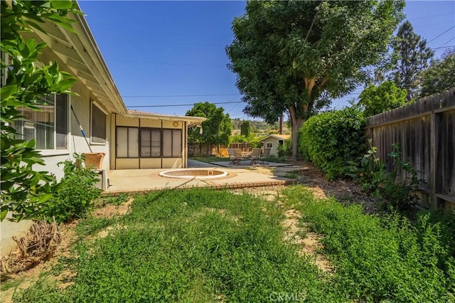 16060 Villa Flores Dr, Hacienda Heights, CA 91745 - fenced backyard featuring a patio and a sunroom