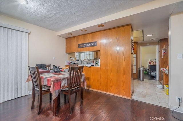 16060 Villa Flores Dr, Hacienda Heights, CA 91745 - dining room featuring wood-type flooring and a textured ceiling
