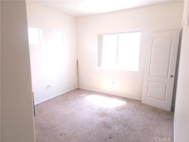 242 Spinnaker St, San Jacinto, CA 92583 - carpeted spare room featuring baseboards