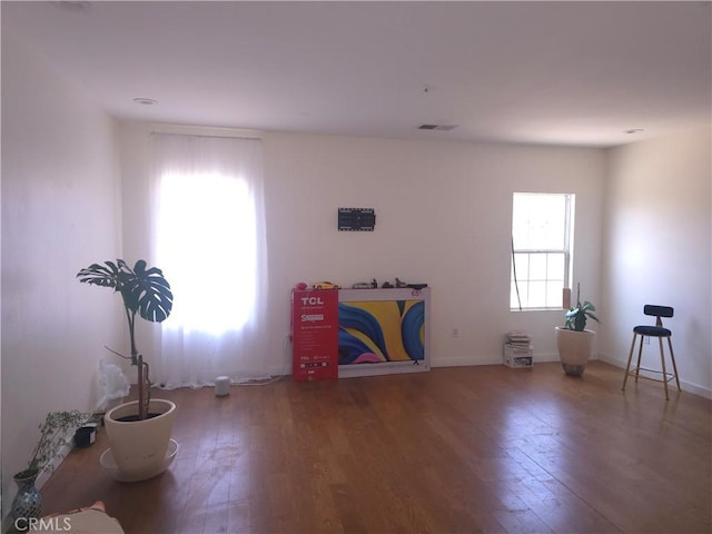 242 Spinnaker St, San Jacinto, CA 92583 - misc room featuring hardwood / wood-style floors