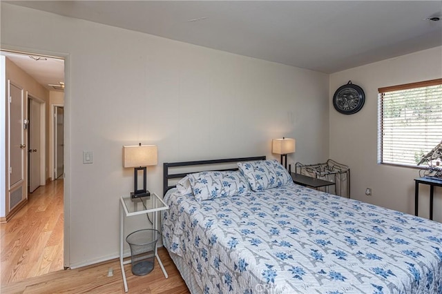 14048 Wagon Mound Rd, Rancho Cascades, CA 91342 - bedroom with wood finished floors and baseboards